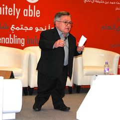 Simon at conference in Qatar